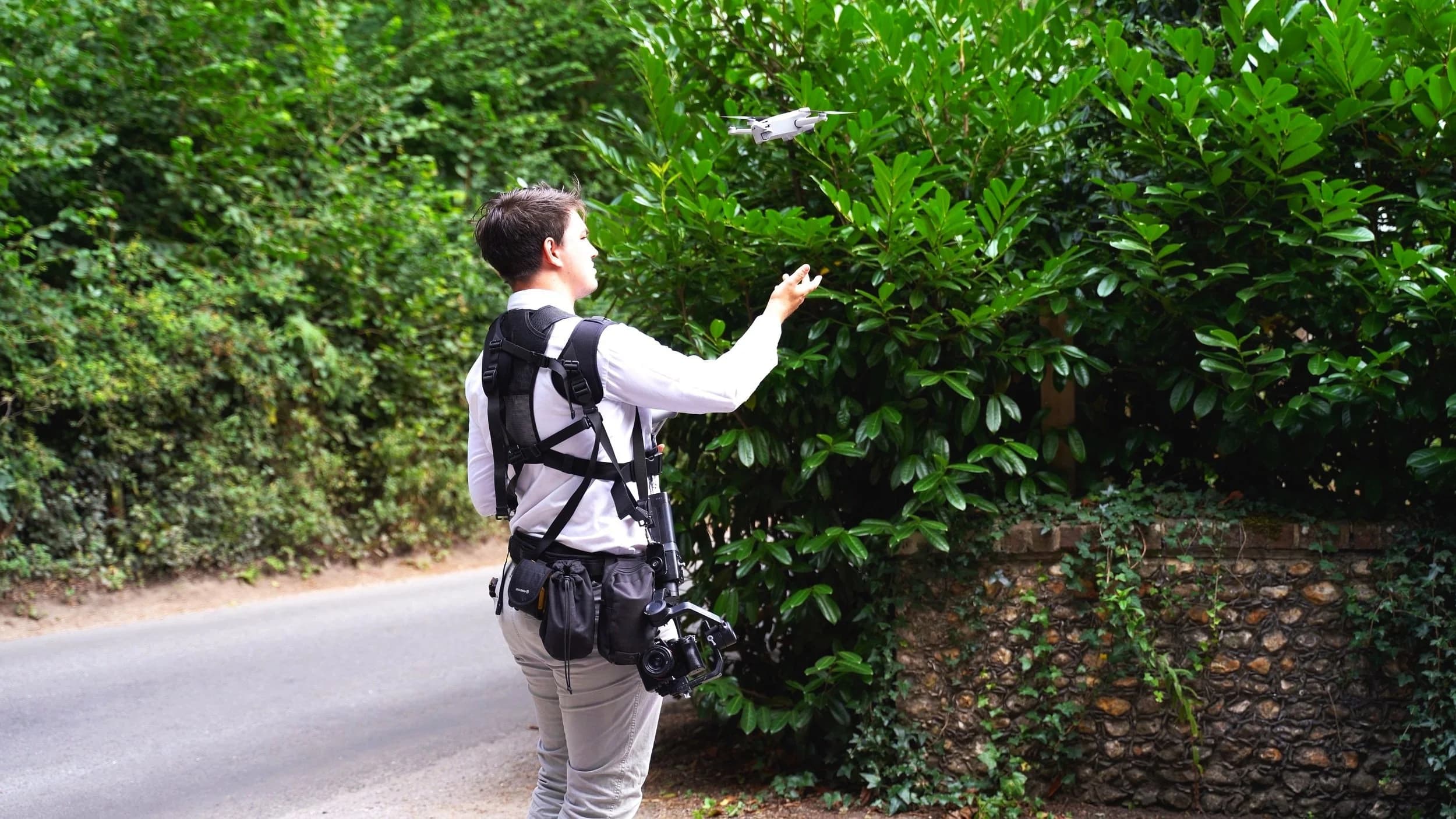 Louis launching drone for aerial wedding coverage